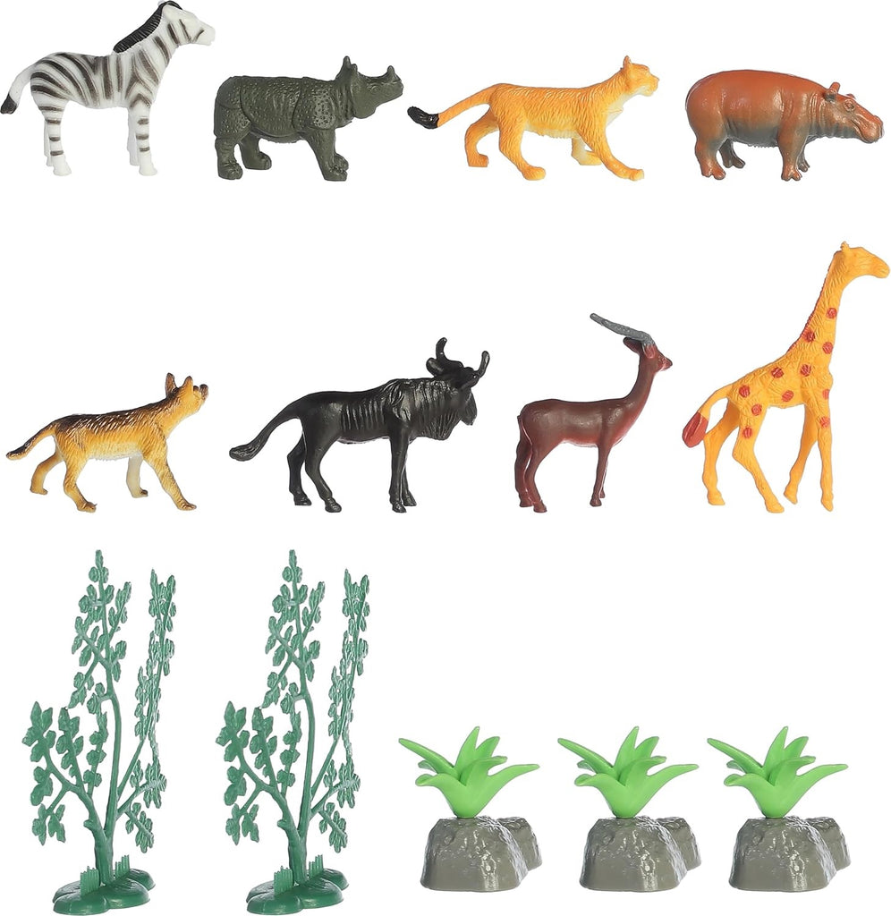 Collection of toy animal figures and plants on a white background